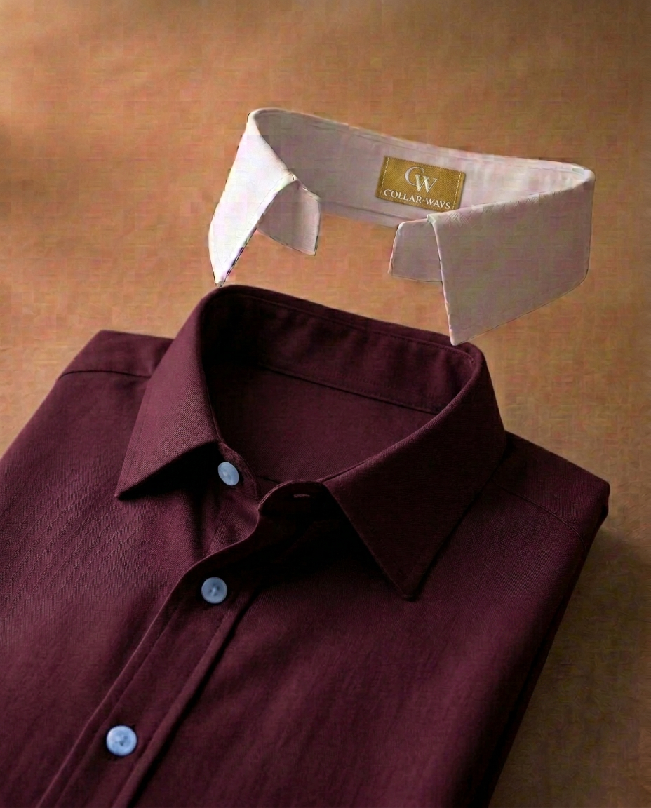 A woven wine dress shirt with a matching wine collar attached and a detachable white Collar-Ways collar floating above the neckline