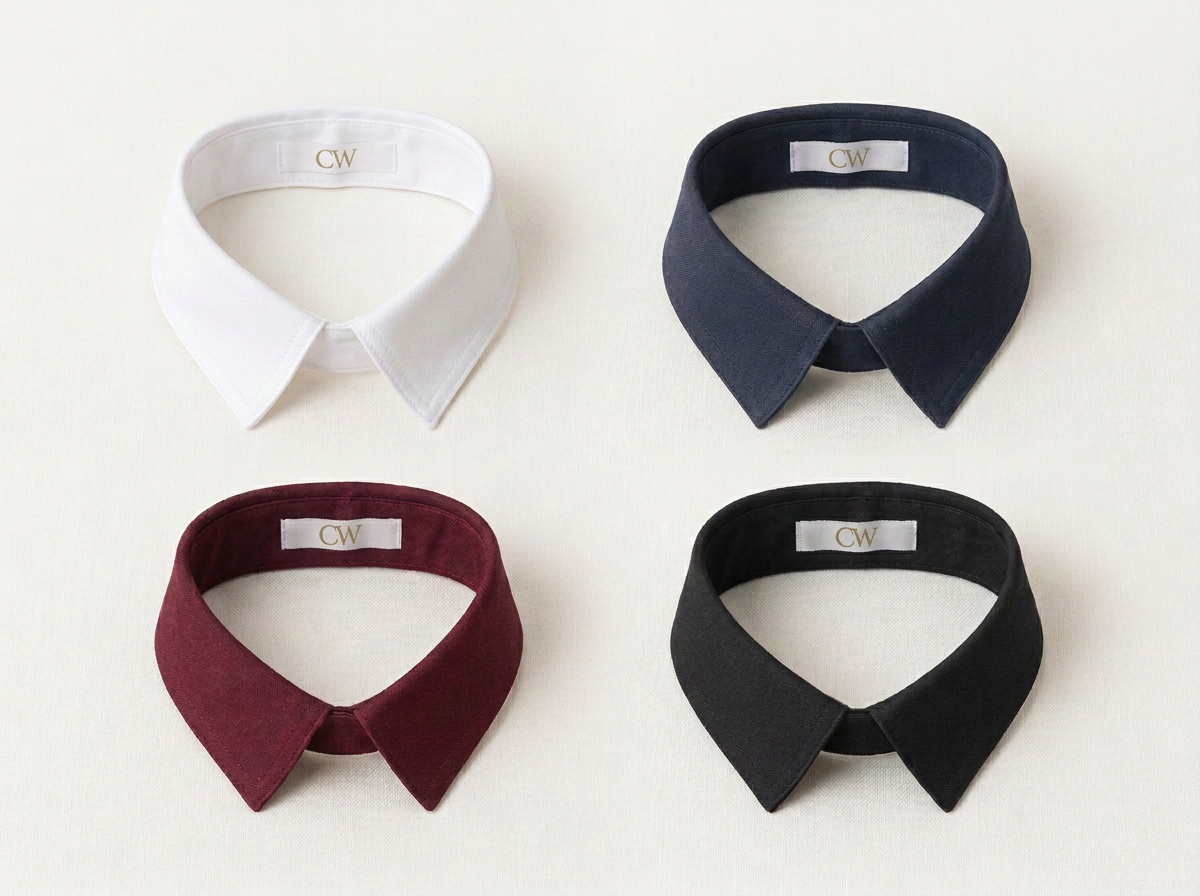 Placeholder product image: a set of interchangeable collar components in crisp white, deep navy, rich burgundy, and executive black